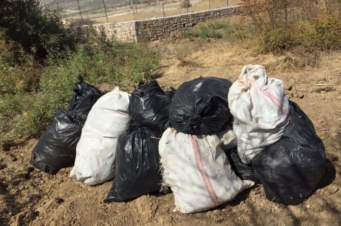 Dere yatağına saklanmış esrar ele geçirildi