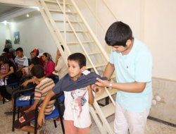 İHH Mersin'de 50 Yetimi Giydirdi