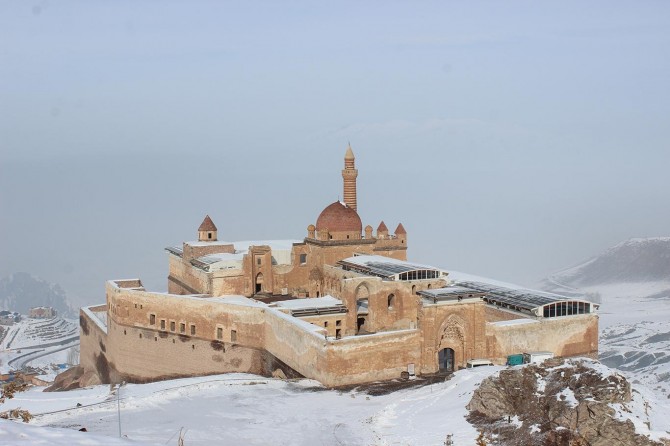 Stunning Ishak Pasha Palace surrounds by white snow