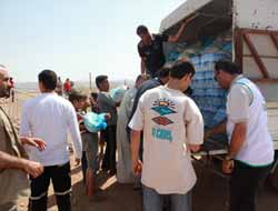 İHH, Reyhanlı'da Suriyelilere Gıda Yardımı Yaptı