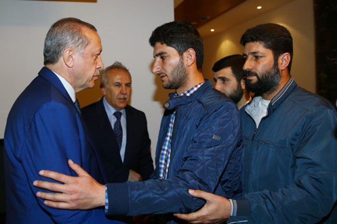 The father who lost his twin children in chemical attack meets Erdoğan