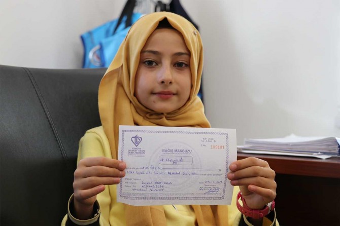 Student donates her award to Arakan