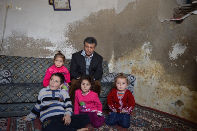 Desperate family living in damp house waits for help