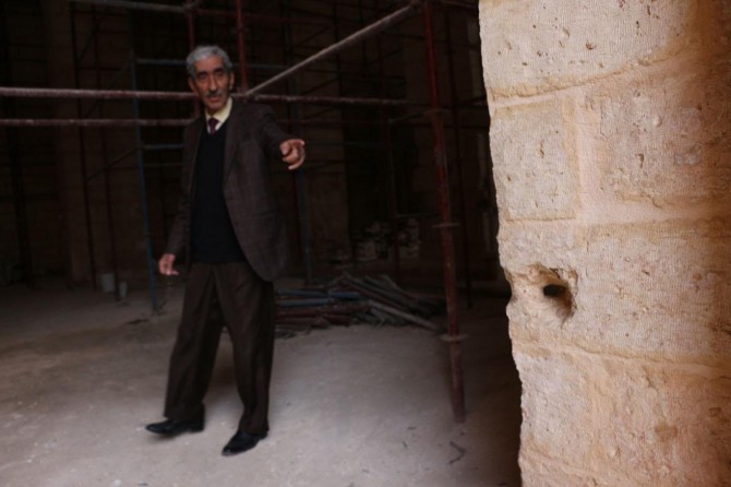 Ahıra çevrilen cami zulmün izlerini duvarlarında taşıyor