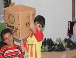 Rahmet Eli'nden 91 Bin TL'lik Giyim Yardımı