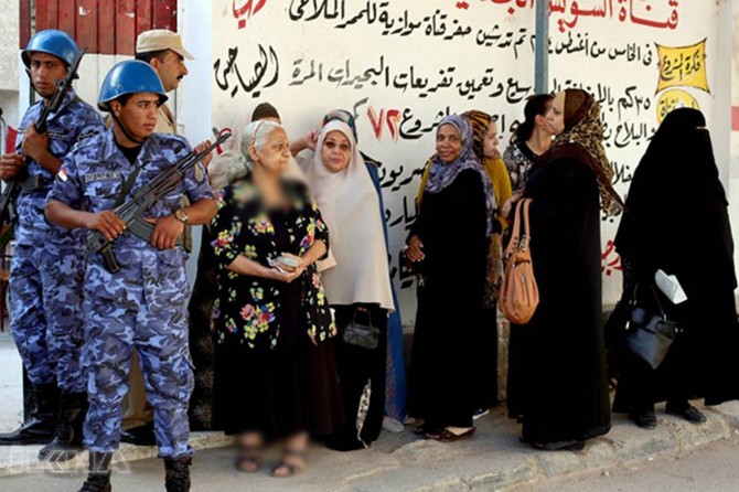 Participation records low in elections despite threats in Egypt