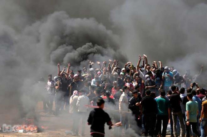 zionist terror in Gaza: 55 martyrs, 2,771 injured