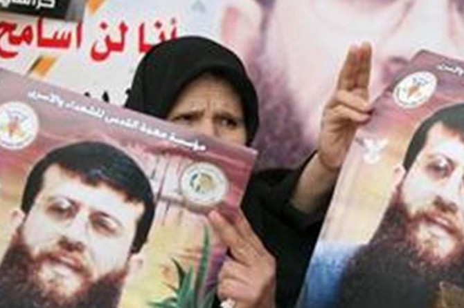 Palestinian leader Khader Adnan continues hunger strike for 57 days