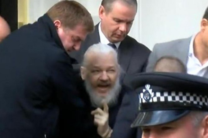 Police detain Wikileaks founder Assange