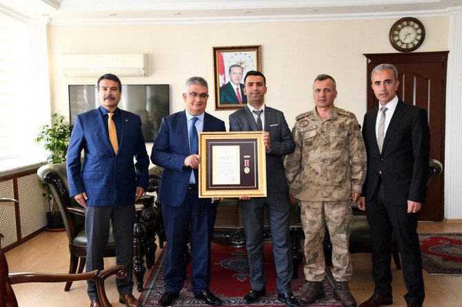 Adıyaman'da 15 Temmuz gazisine övünç madalyası verildi