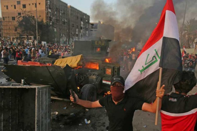 Hejmara kesên ku li Iraqê di xwepêşanan de mirin de derket 100î