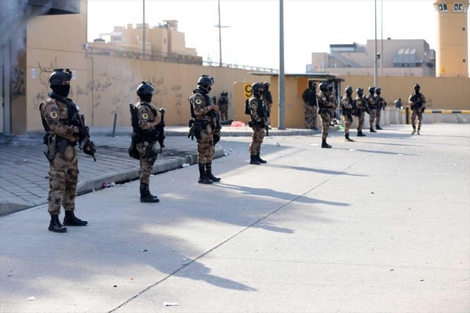 Protesters withdraw from the US Embassy in Baghdad