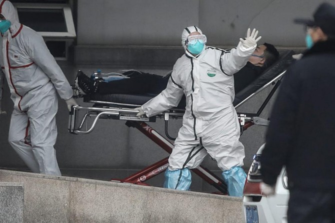 Wuhan shuts public transport over outbreak