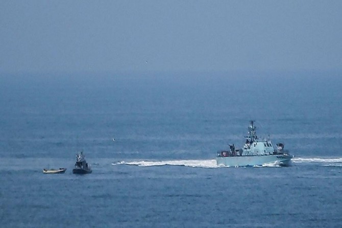 Zionist gangs’ gunboats attack fishermen, their boats in Gaza waters