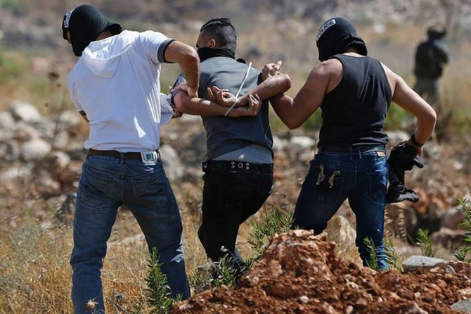 Zionist gangs kidnap 33 Palestinians in West Bank