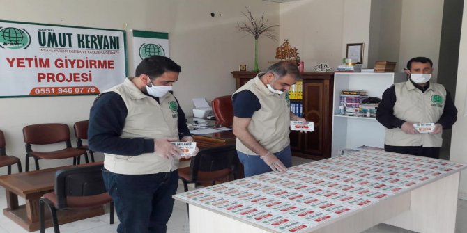 Mardin Umut Kervanından yetim çocuklara giyim hediye çeki