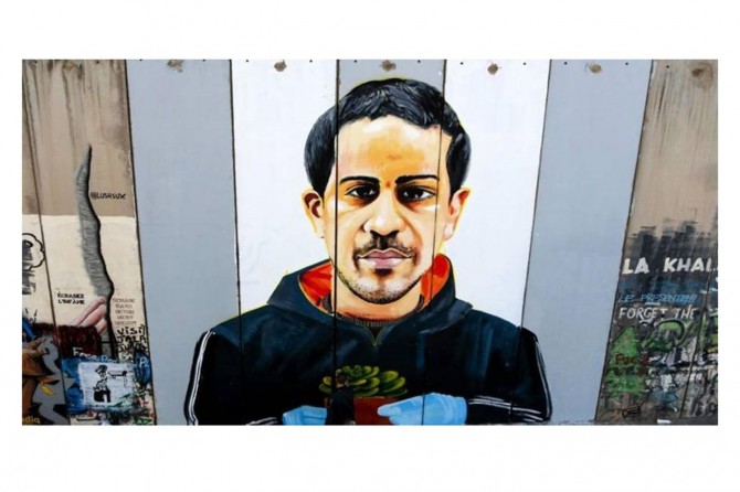 Siyonist işgalcilerin şehit ettiği engelli İyad Hallak'ın resmi Ayrım Duvarı'na çizildi