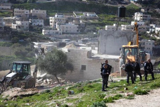 Zionist occupation army razes home under construction in Beit Awwa town