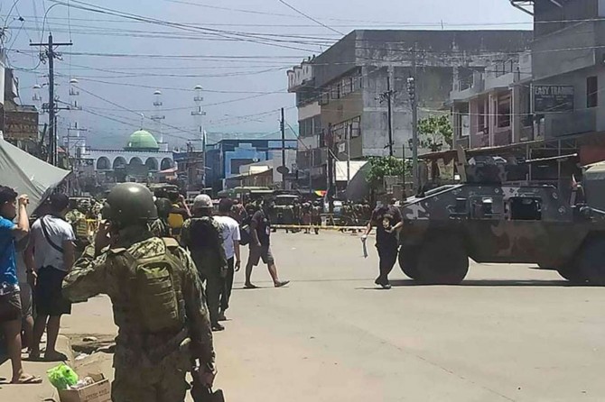 At least 15 killed in twin bombings in Philippines