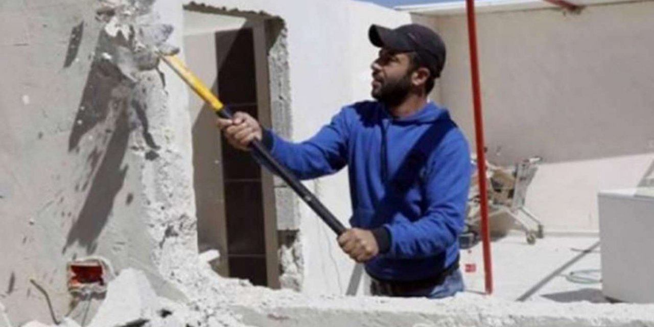 Zionist occupation regime forces Palestinians to raze his own house