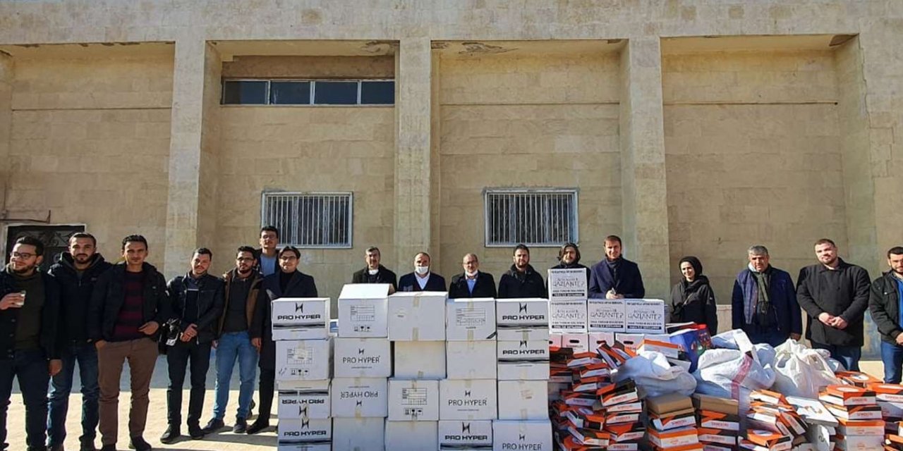 Suriyeli öğrencilere kışlık giyim ve gıda yardımı dağıtıldı