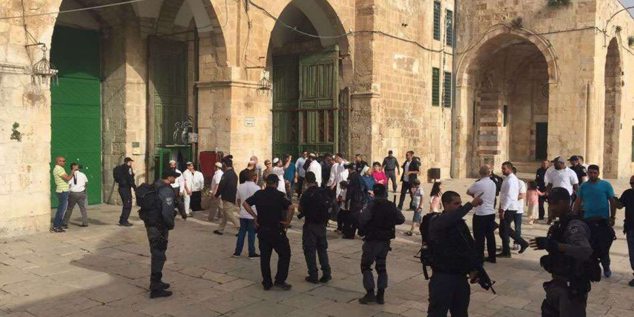 A horde of zionist settlers defile Aqsa Mosque