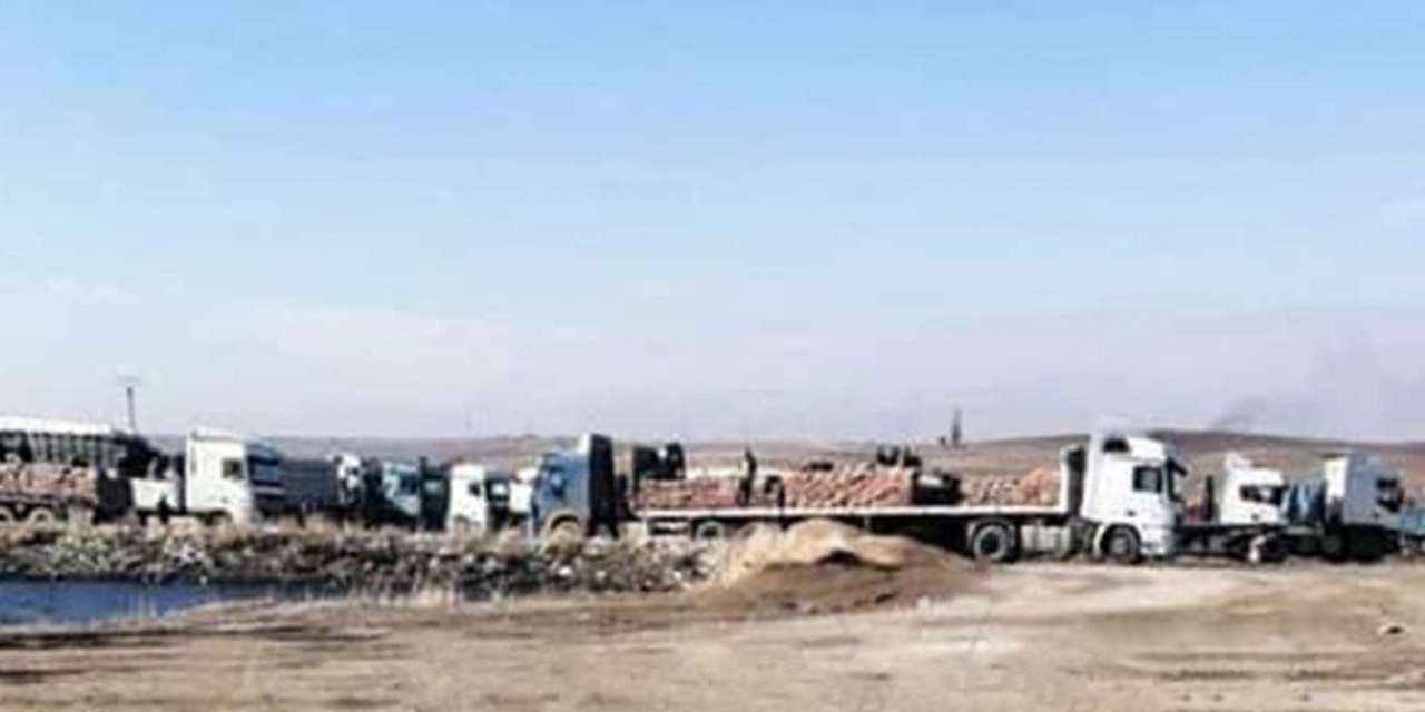 Suriye'deki kıtlığa rağmen ABD ve PKK onlarca buğday yüklü kamyonu Irak'a gönderdi