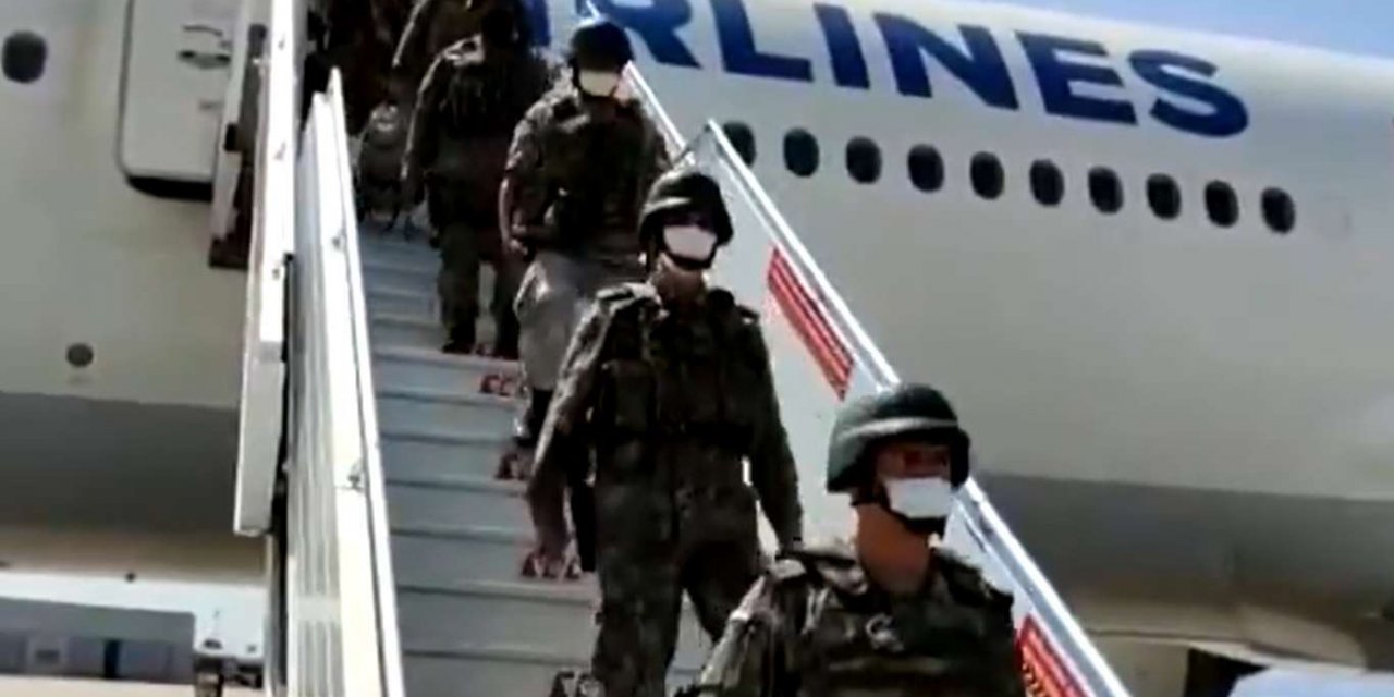 The plane evacuating first Turkish troops from Afghanistan arrives back in Turkey
