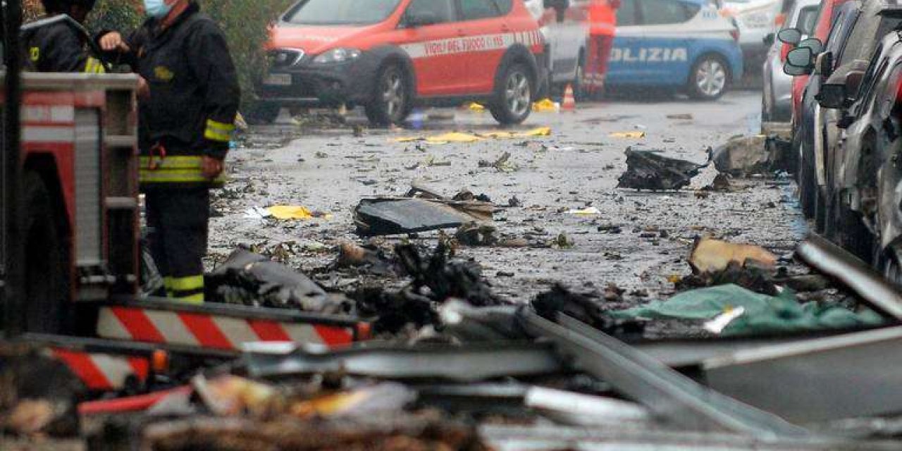 Small plane crashes into building in Italy, killing 8 people on board