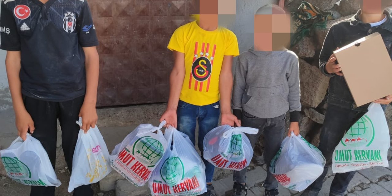Umut Kervanından Kurban Bayramı öncesi Çınar'da yetim ve muhtaç ailelere giyim yardımı