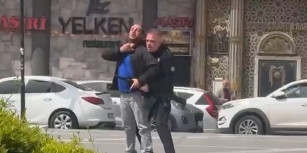 Diyarbakır'da sokak ortasında pompalı tüfekle gezen şahsa müdahale anı kameralara yansıdı