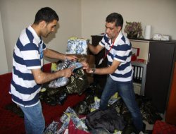 Engelli Derneği, bin kişiyi giydirdi