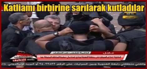 Katliamı birbirine sarılarak kutladılar