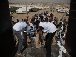 İHH Irak'a sığınan Suriyeli Kürtleri yalnız bırakmadı