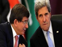 Kerry, Davutoğlu'nu Paris'e davet etti