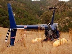 Tarlada terk edilen helikopterin sahibi bulunamıyor