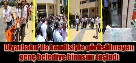 Diyarbakır'da kendisiyle görüşülmeyen genç belediye binasını taşladı
