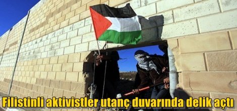 Filistinli aktivistler utanç duvarında delik açtı