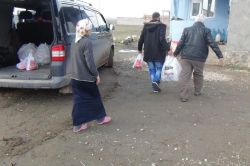 Doğubayazıt’ta muhtaç ailelere yardım dağıtıldı
