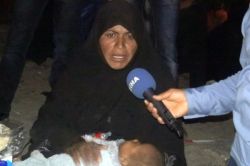 Açlıktan ölecek Suriyeli bebeği emzirdi