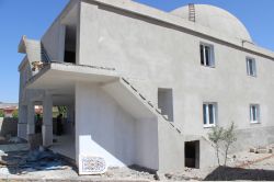 Ceylanpınar’da inşaatı yarım kalan cami yardım bekliyor