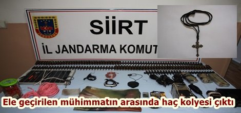 Ele geçirilen mühimmatın arasında haç kolyesi çıktı