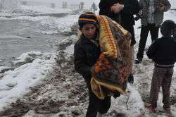 Çadırda yaşayan Suriyeli aileler evlere yerleştirildi